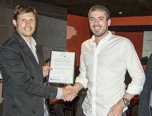 Nigel Ruxton receiving award